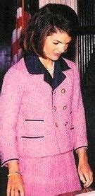 jacqueline kennedy wears her pink chanel suit